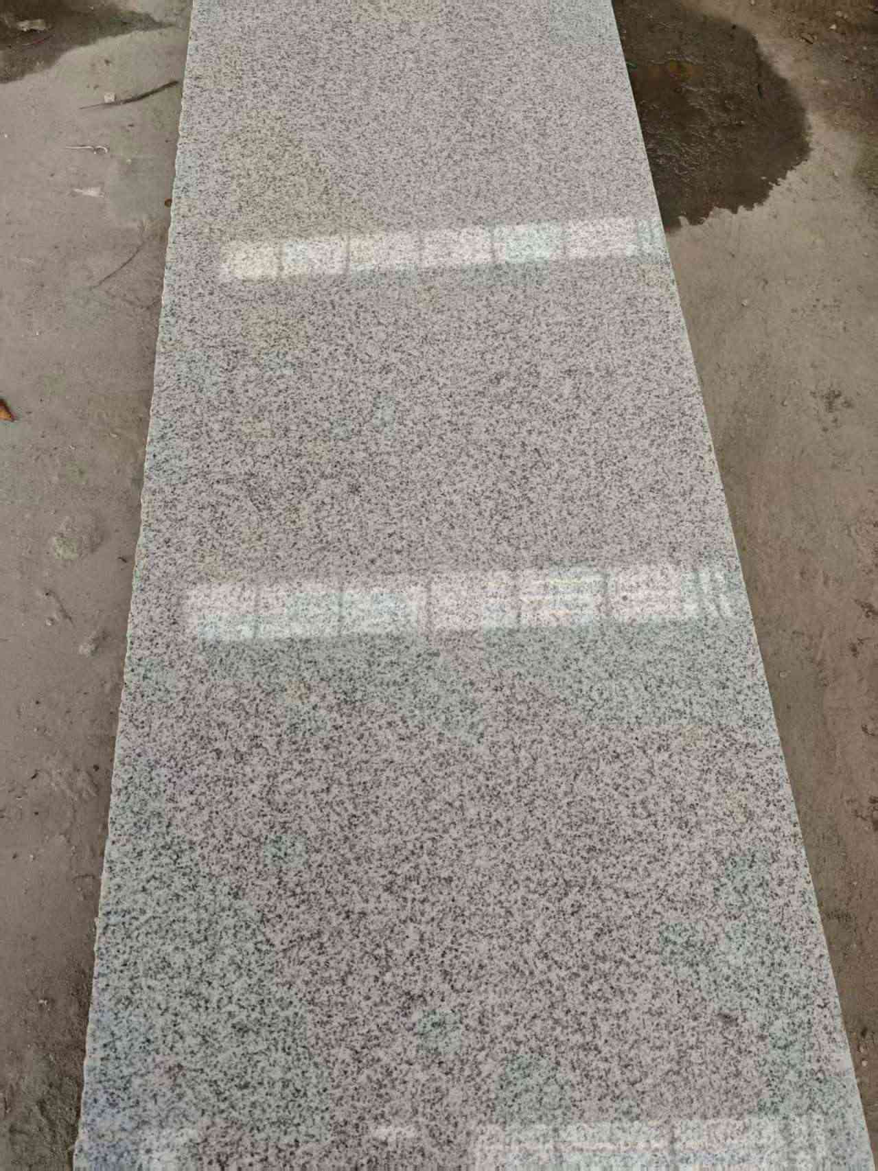 钦州芝麻白光面毛板